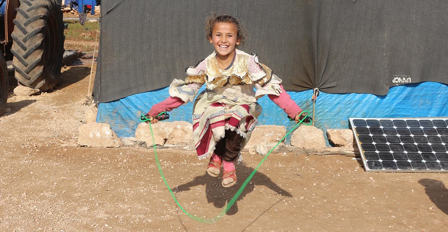 Syrian girl skipping
